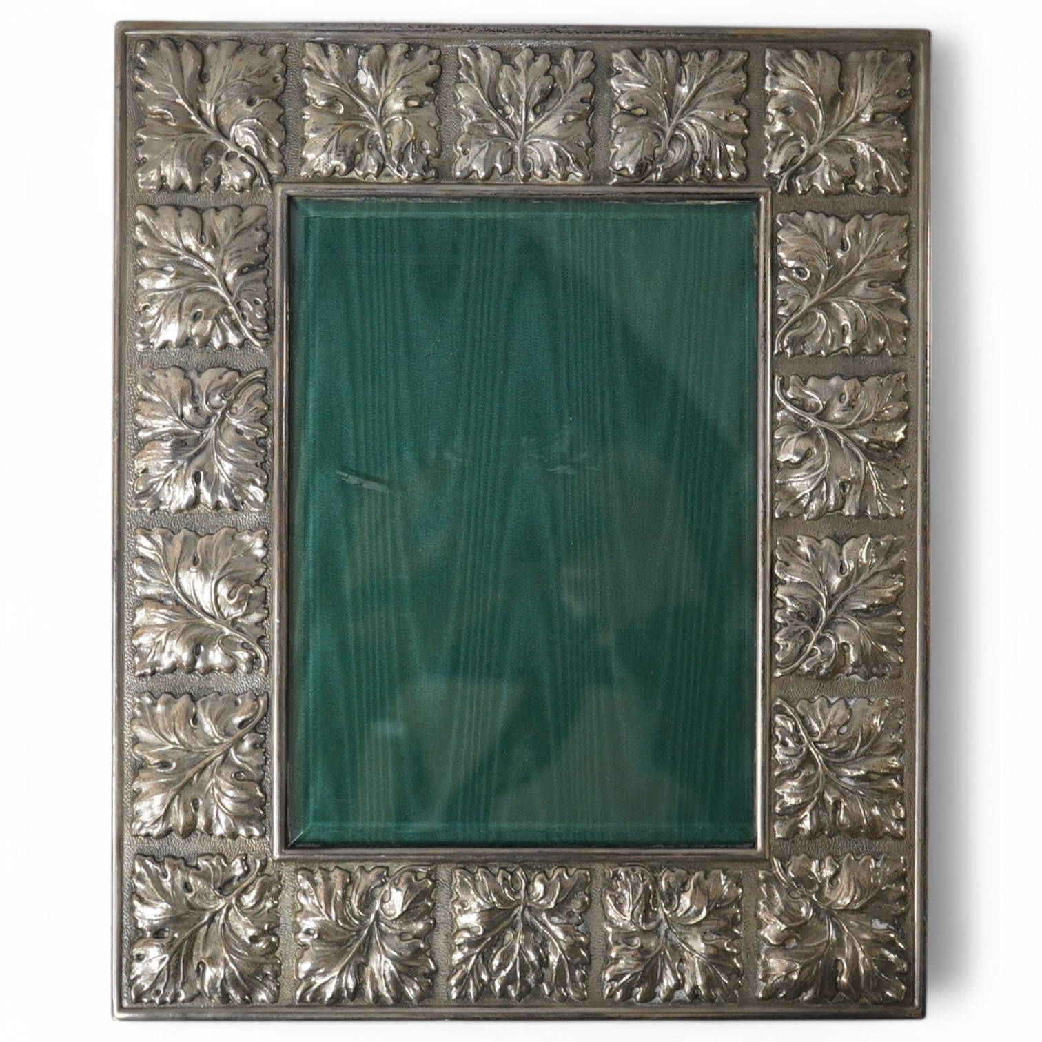 A modern Italian 925 sterling mounted Gianmaria Buccellati rectangular photograph frame, embossed with leaves, 27.6cm by 22.9cm. Condition - fair